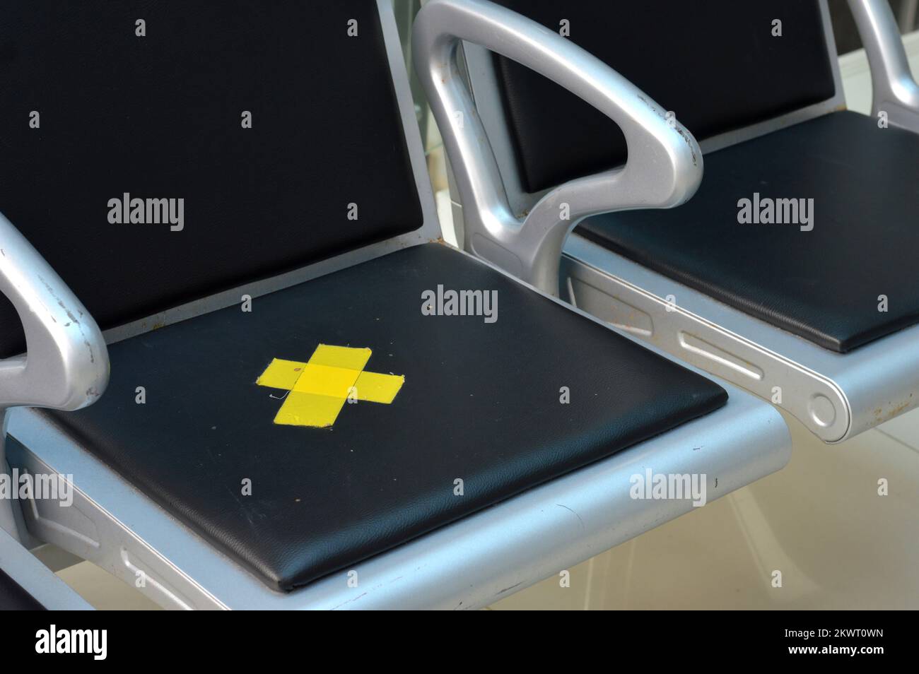 chairs in the waiting room with distance rules Stock Photo Alamy