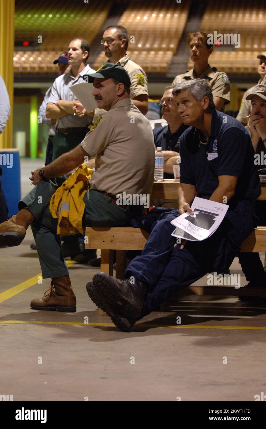 Tampa, FL, October 24, 2005-Members of the Interagency Incident Support Team meet at an operational briefing on Monday morning at the Florida State Fairgrounds which is being used as a base of operations until the needs of the state are determined from damage caused by Hurricane Wilma.. Photographs Relating to Disasters and Emergency Management Programs, Activities, and Officials Stock Photo