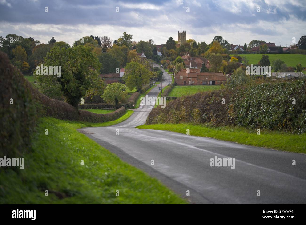 North Nottingham village, Askam, entering autumn, with St Nicholas' Church prominently sitting above the village Stock Photo