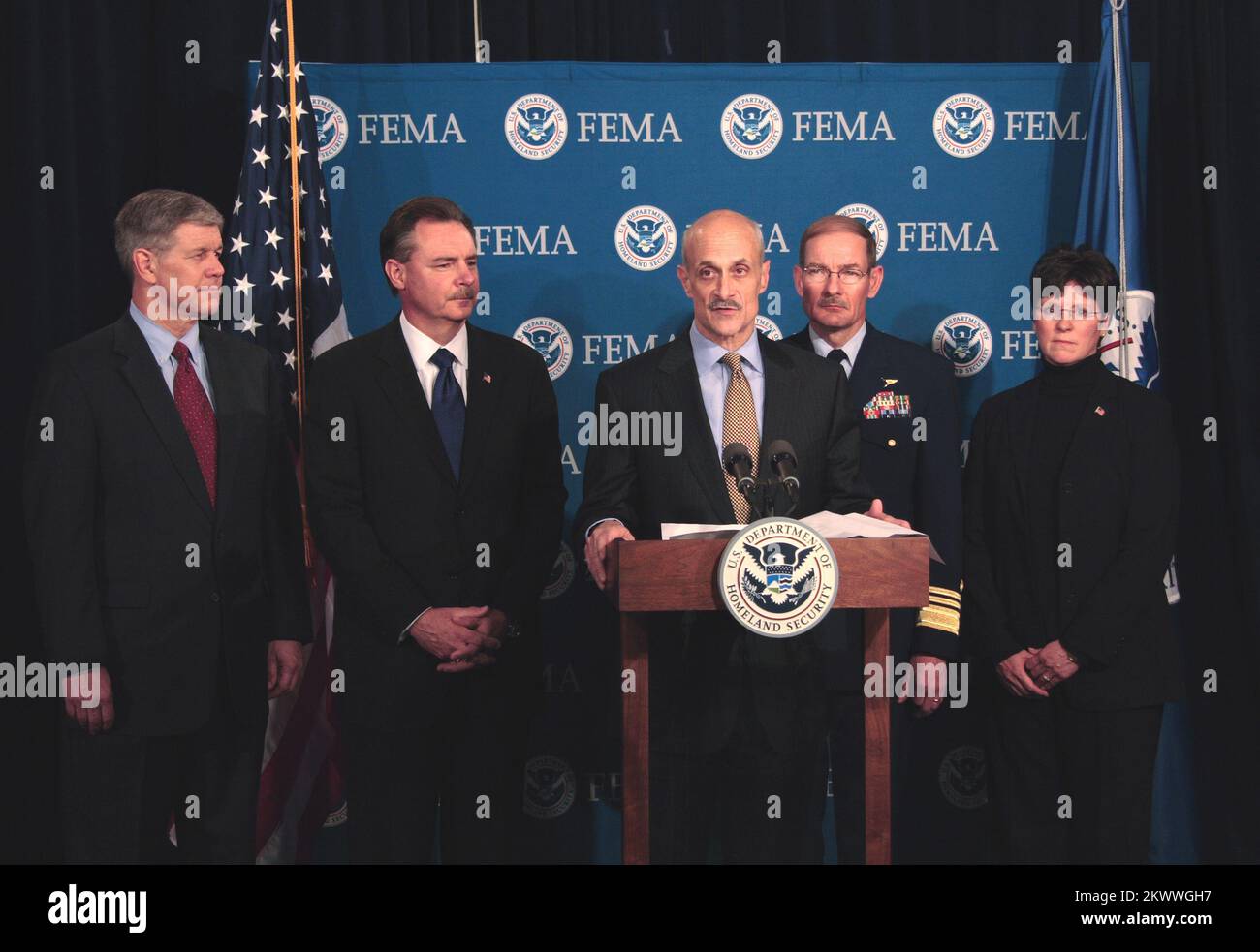 Washington, DC, April 6, 2006   Department of Homeland Security Secretary, Michael Chertoff announces President Bush's appointment of R. David Paulison as the Director of FEMA at FEMA Headquarters. Behind him and appointed are l-r, David Maurstad as FEMA's Mitigation Division director, R. David Paulison Director of FEMA, Vice Admiral Harvey E. Johnson, Jr. as the deputy director and chief operating officer of FEMA, and Deidre Lee who has been name deputy director of Operations. Bill Koplitz/FEMA.. Photographs Relating to Disasters and Emergency Management Programs, Activities, and Officials Stock Photo