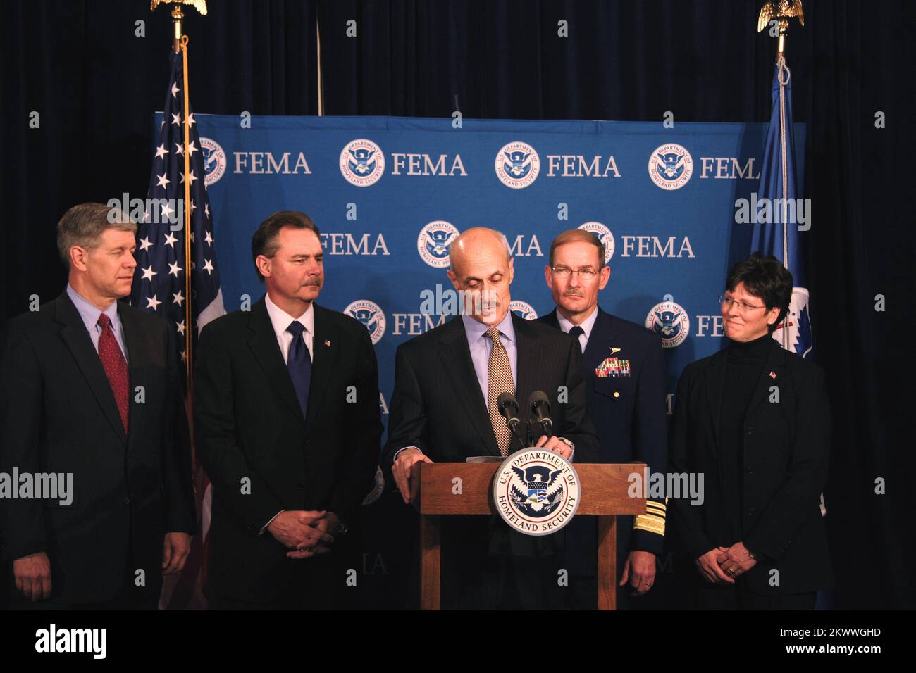 Washington, DC, April 6, 2006   Department of Homeland Security Secretary, Michael Chertoff, announces President Bush's appointment of R. David Paulison as the Director of FEMA at FEMA Headquarters. Also appointed are l-r, David Maurstad as FEMA's Mitigation Division director, R. David Paulison as FEMA Director, Vice Admiral Harvey E. Johnson, Jr. as the deputy director and chief operating officer of FEMA, and Deidre Lee who as the director of Operations. Bill Koplitz/FEMA.. Photographs Relating to Disasters and Emergency Management Programs, Activities, and Officials Stock Photo