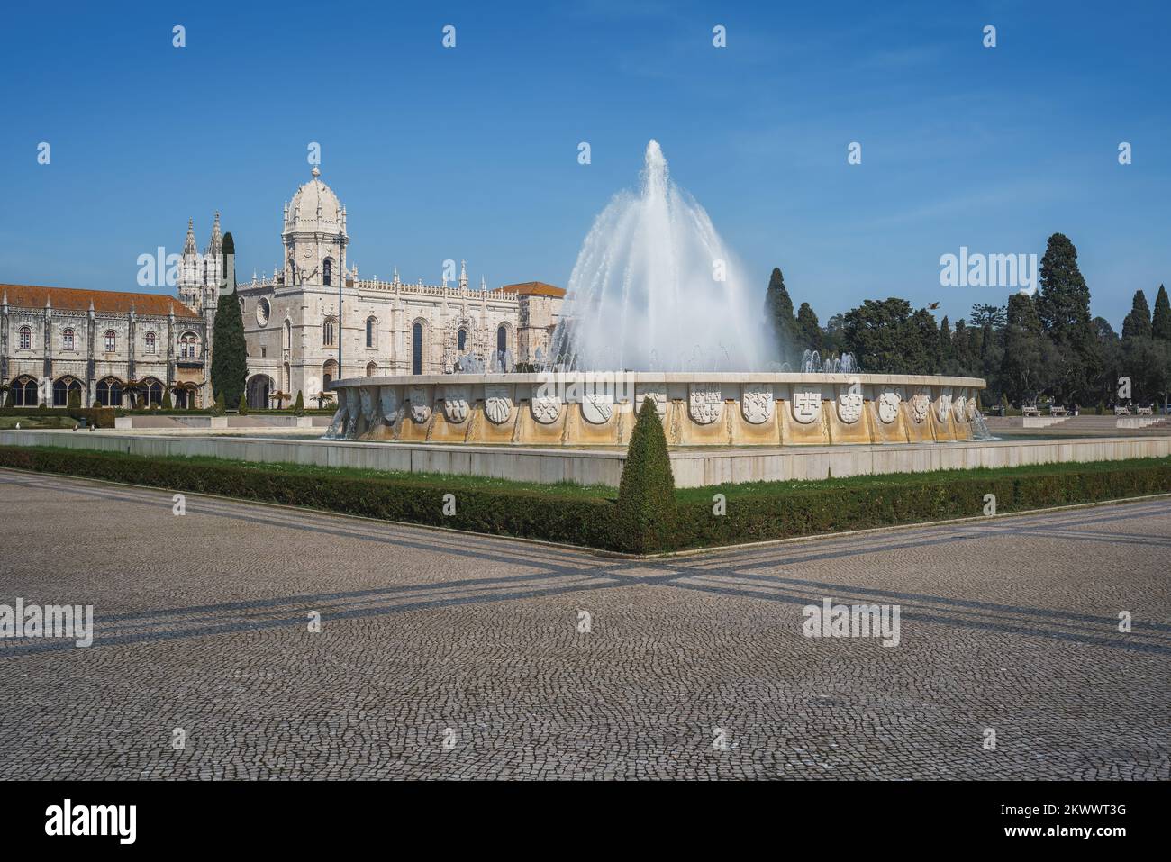 Fountain at Jardim da Praca do Imperio Square with Jeronimos Monastery - Lisbon, Portugal Stock Photo