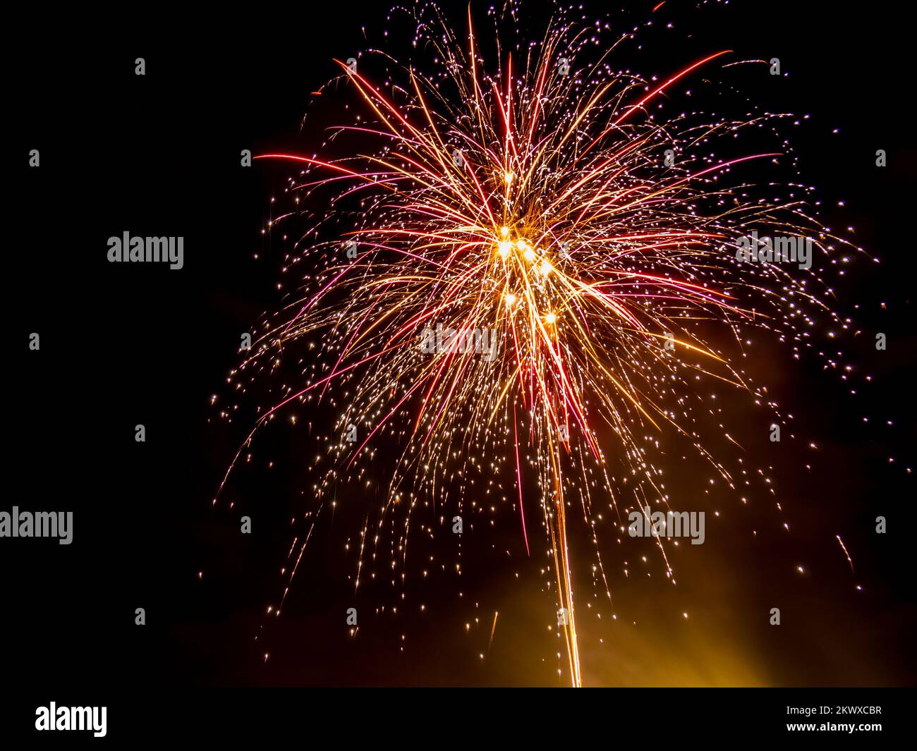 Fireworks in the black night sky Stock Photo