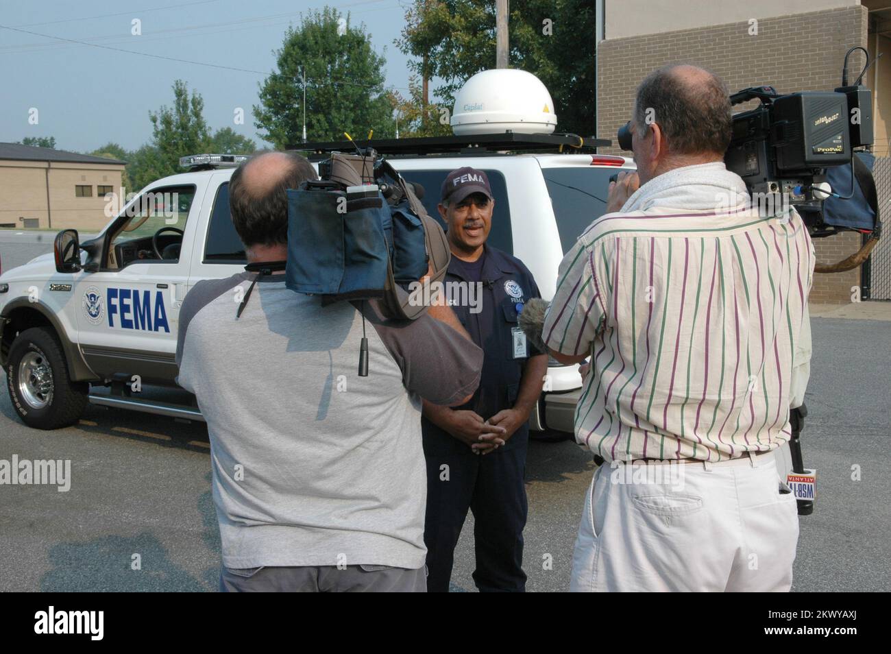 Marietta, GA, August 16, 2007   FEMA Federal Incident Response Support Team (FIRSTeam) leader Willie Womack speaks with the media before departing for Puerto Rico in anticipation of Hurricane Dean. The FIRST Team leads FEMA's initial response to disasters. Mark Wolfe/FEMA.. Photographs Relating to Disasters and Emergency Management Programs, Activities, and Officials Stock Photo