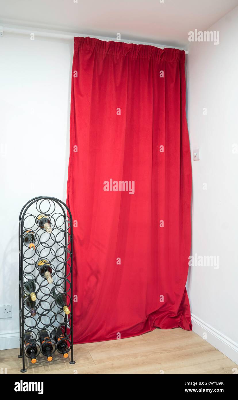 Energy saving concept, a heavy lined curtain between rooms in a house