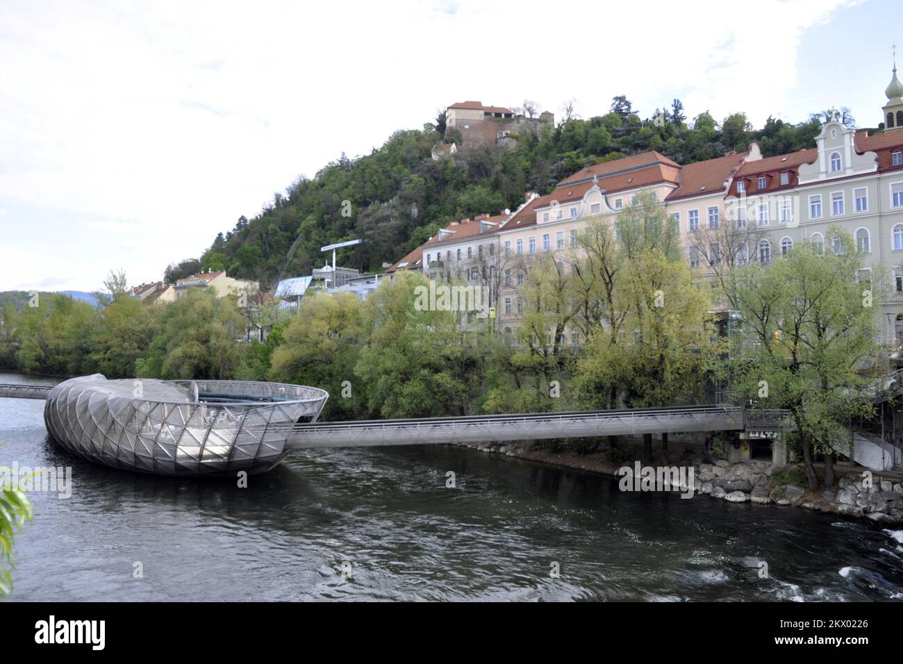 17.04.2017., Graz, Austrija - Murinsel, Unique artificial island with a cafe, interior design showroom & amphitheater in modern surrounds. Murisel is actually not an island at all, but an artificial floating platform in the middle of the Mur river. Photo: Goran Novotny/HaloPix/PIXSELL Stock Photo