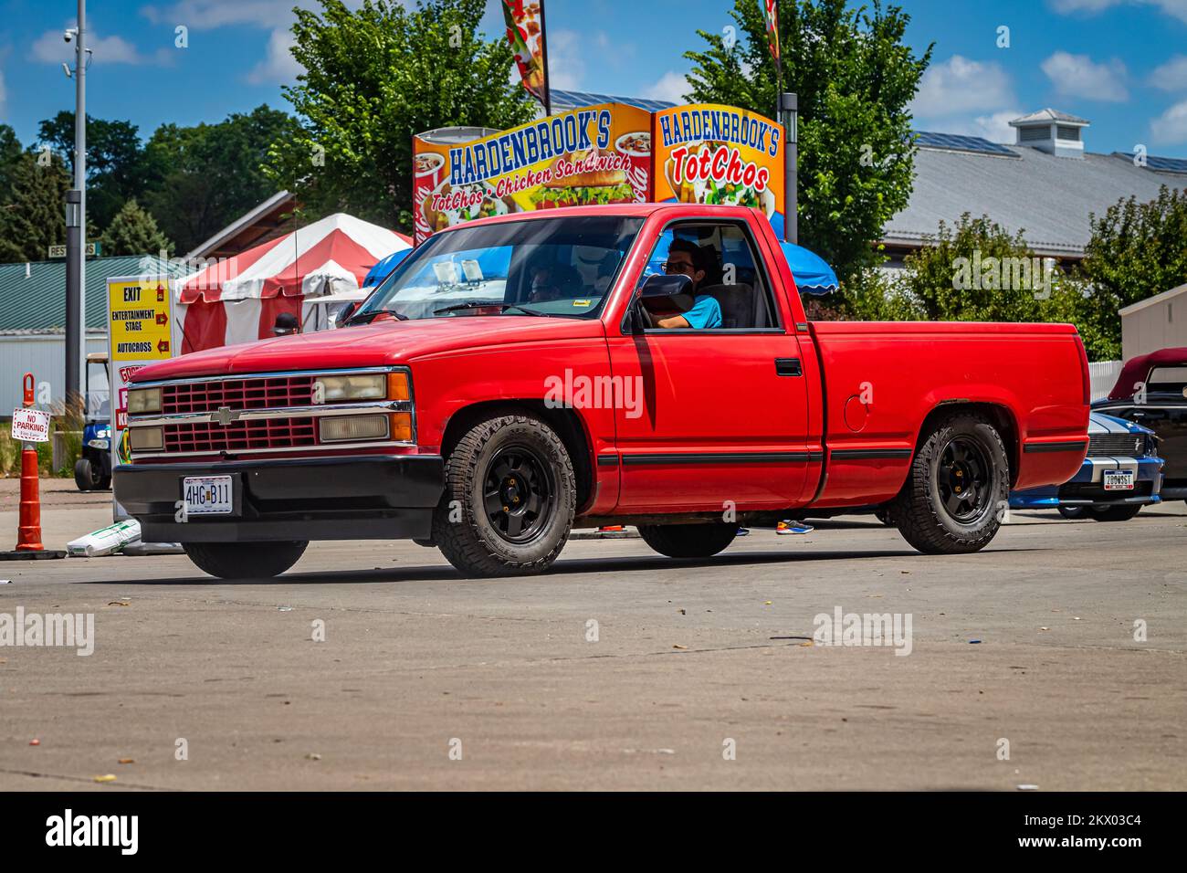Des Moines, IA - July 03, 2022: Wide angle front corner view of a 1995 Chevrolet Silverado 1500 Pickup at a local car show. Stock Photo