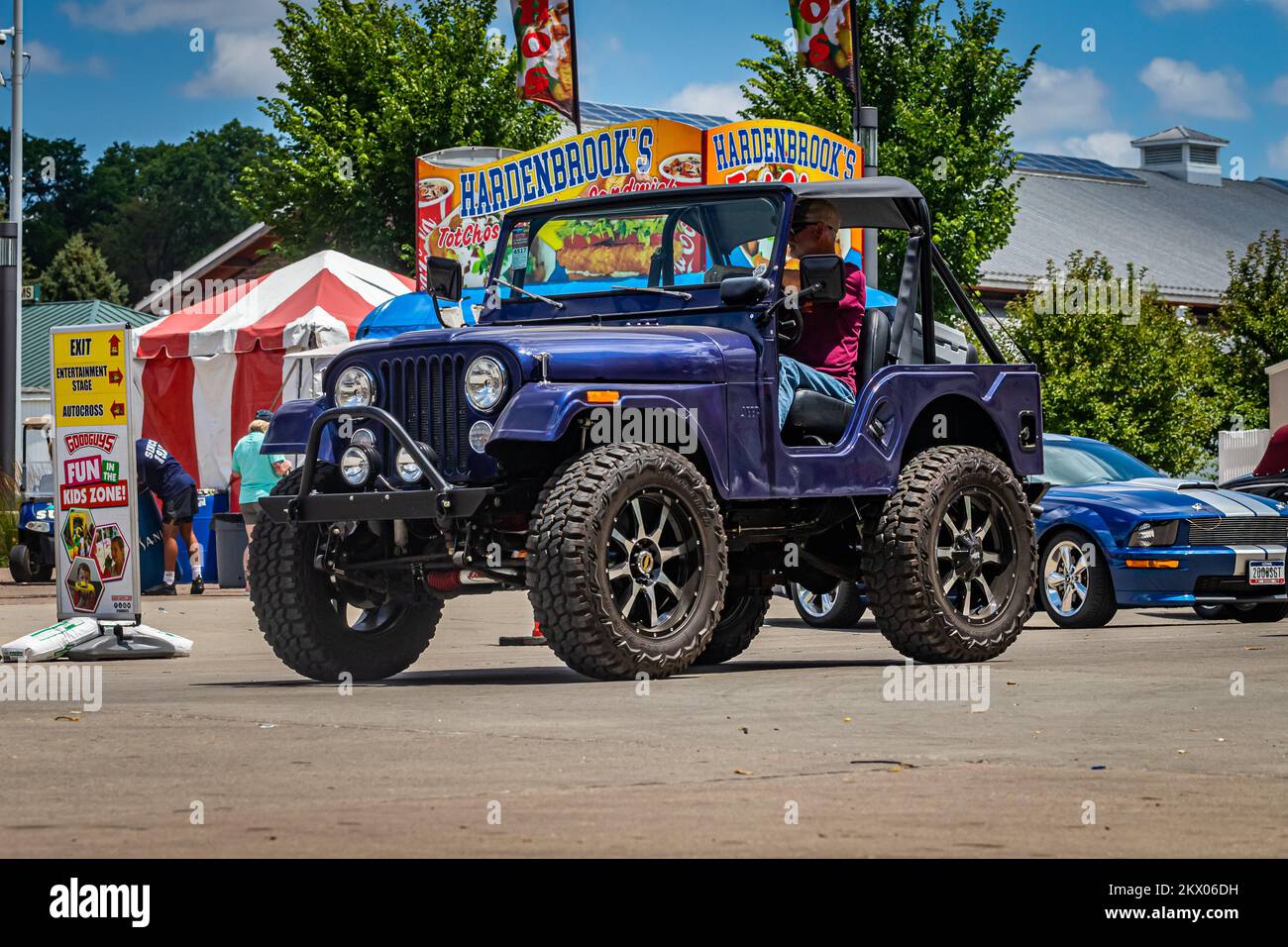 Des Moines, IA - July 03, 2022: Wide angle front corner view of a 1970 Willys Jeep CJ5 at a local car show. Stock Photo