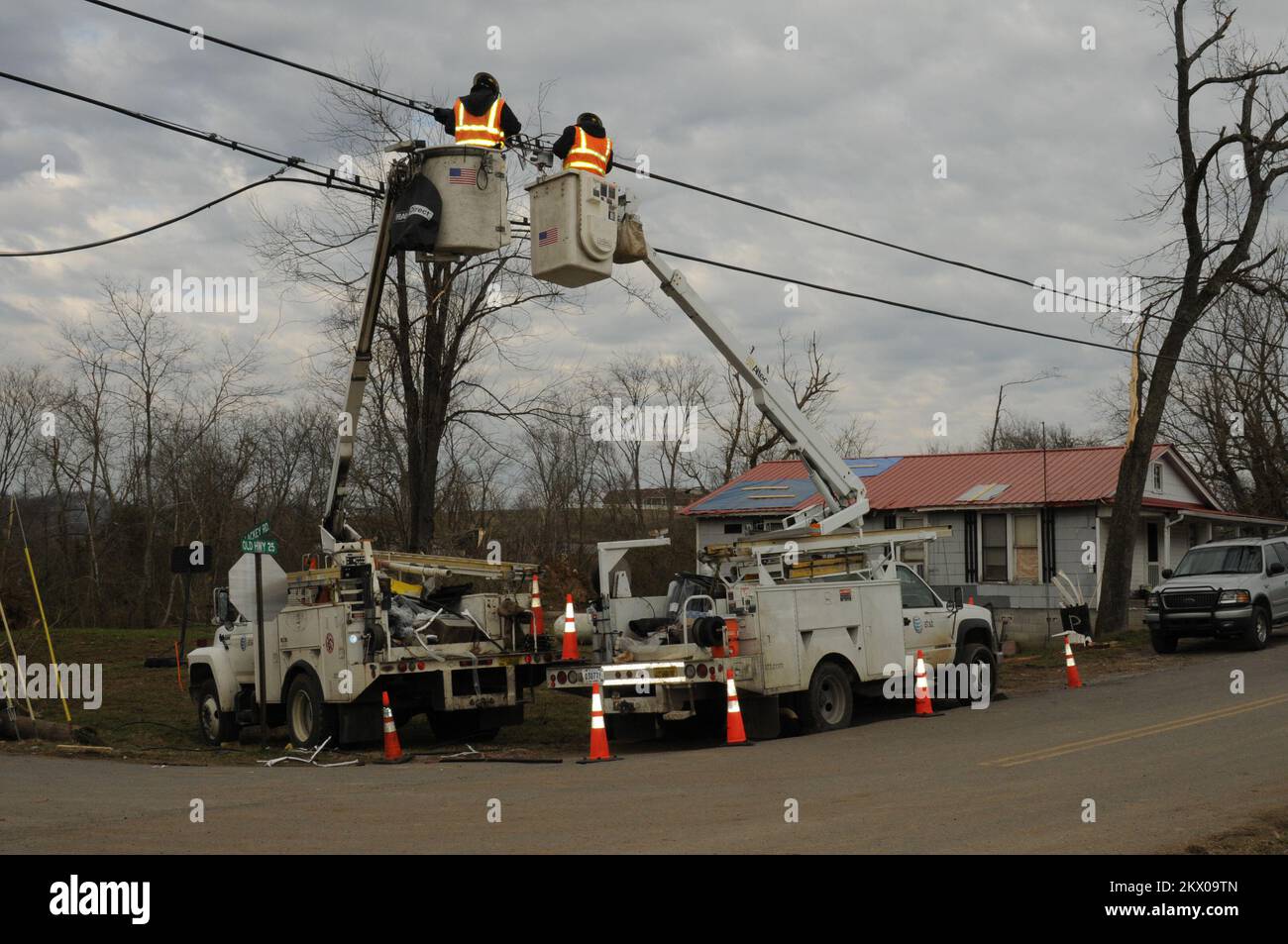 Linemen are Restoring Services in Castalian Springs, TN.. Photographs Relating to Disasters and Emergency Management Programs, Activities, and Officials Stock Photo