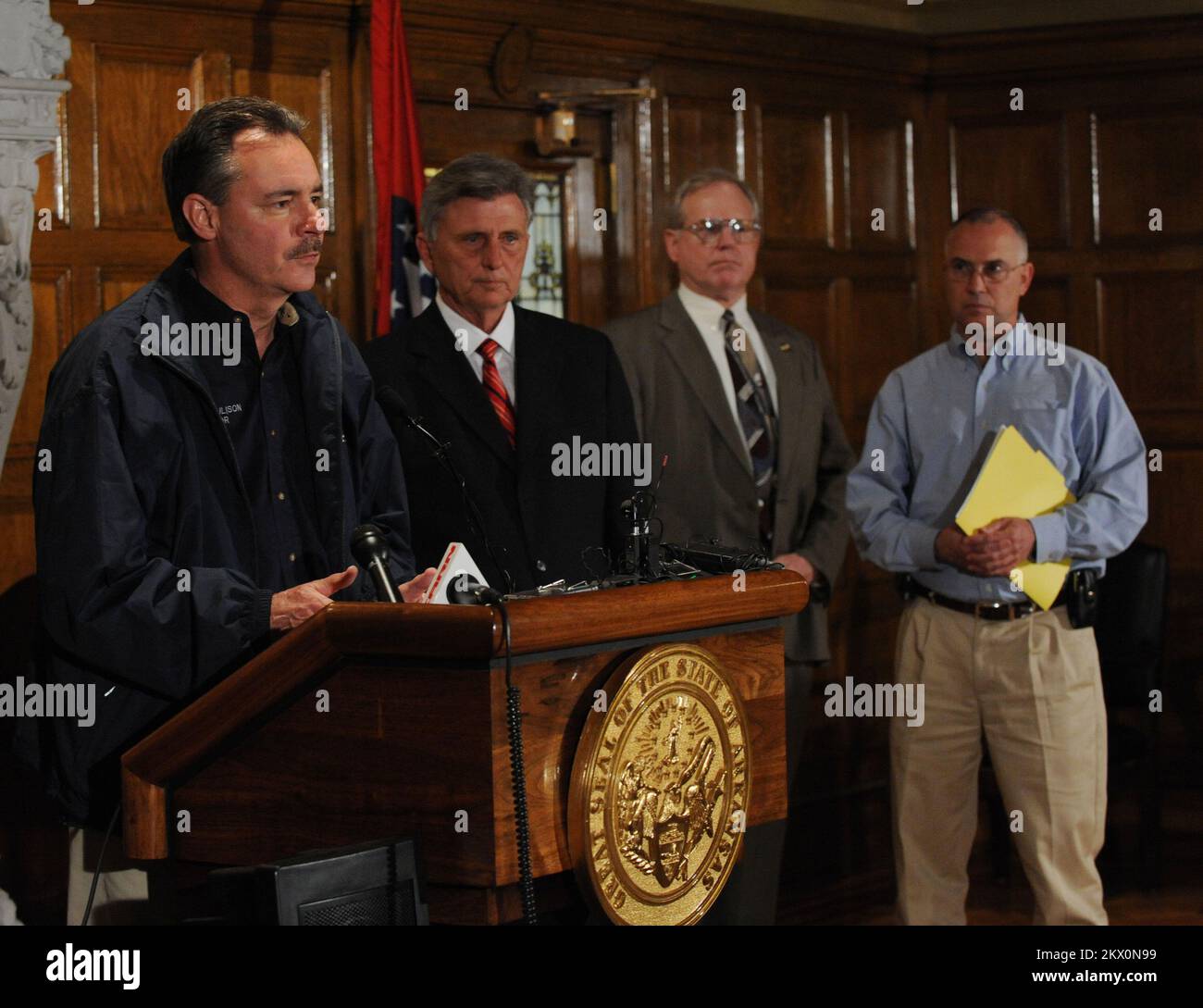 Severe Storms, Tornadoes, and Flooding,  LIttle Rock, AR, March 31, 2008   FEMA Administrator David Paulison, left, speaks at a press conference with Arkansas Governor Mike Beebe, second from right, and David Maxwell, far right, Director of Arkansas Department of Emergency Management at the State House. LIttle Rock, AR-FEMA Admistrator Dave Paulison, left, speaks at a press conference with Arkansas Governor Mike Beebe, second from right, and David Maxwell, far right, Director of Arkansas Department of  Emergency Management at the State House.. Photographs Relating to Disasters and Emergency Ma Stock Photo