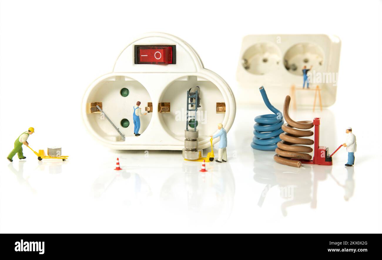 electricity work through miniatures as a concept for an electricity shop Stock Photo