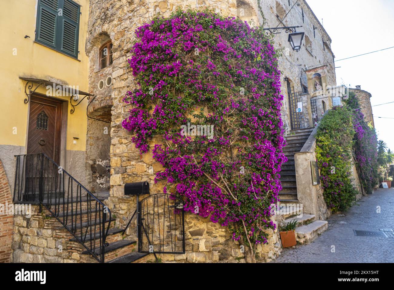 Medieval town alley bougainvillea hi-res stock photography and images ...