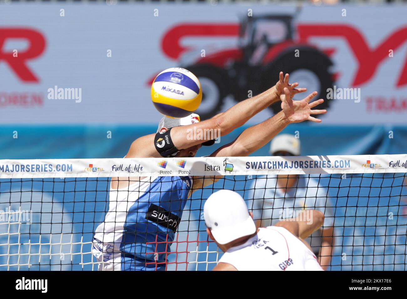 https://c8.alamy.com/comp/2KX17E6/01072017-croatia-porec-volleyball-tournament-swatch-beach-volleyball-major-series-the-fourth-quarter-finals-between-usa-gibbcrabb-taylor-and-italy-luponicolai-paolo-nicolai-jacob-gibb-photo-luka-stanzlpixsell-2KX17E6.jpg