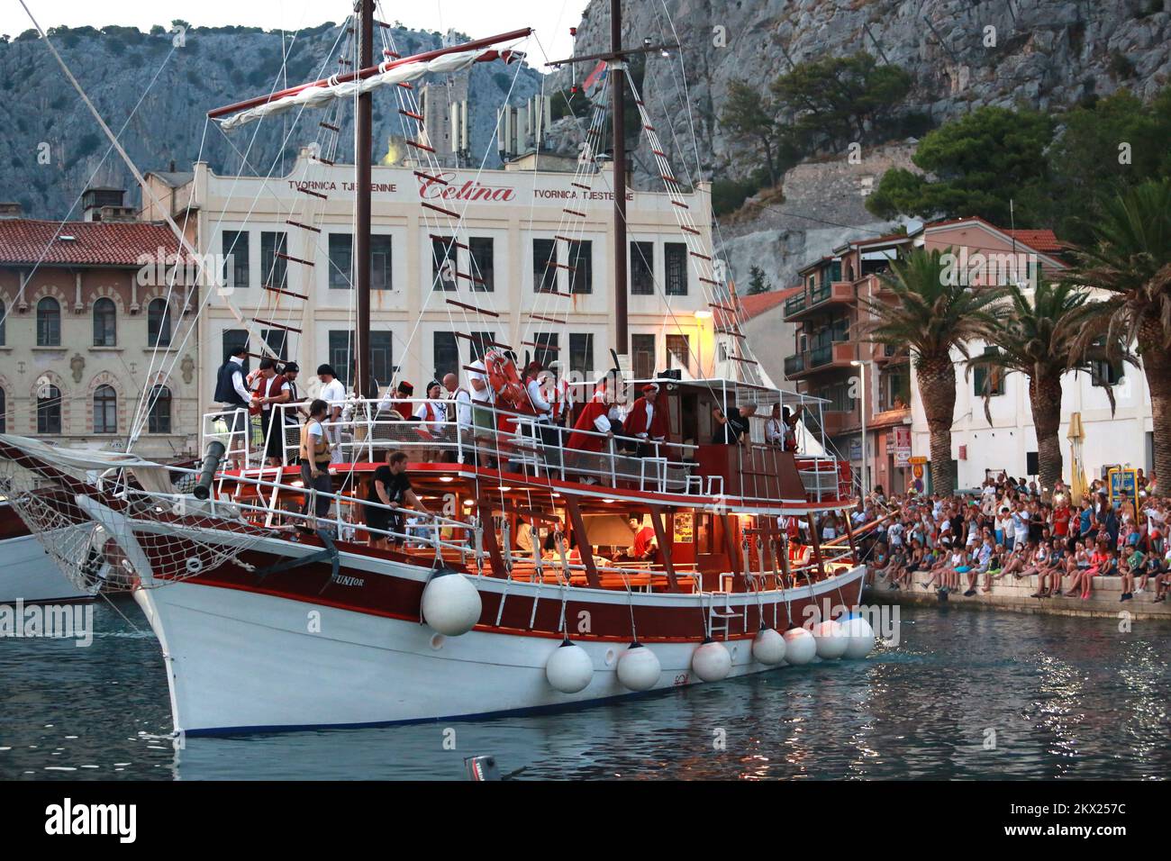 18.08.2017., Omis, Croatia - Reconstruction of the battle between Omis pirates and Venetians that took place in the 13th century. It involves hundreds of participants dressed as pirates and Venetians in the galleys and Sagitta (high speed pirate boats). From the 12th to the 14th century Omis was a dangerous place for ships to pass by, as the city was ruled by Pirates, during more then two centuries trade ships and other Wessel who encountered the Sagittas (the Arrow - special Wessel build for fast attacks and ever faster retrieval) was often attacked and defeated by the Omis pirates. The base Stock Photo