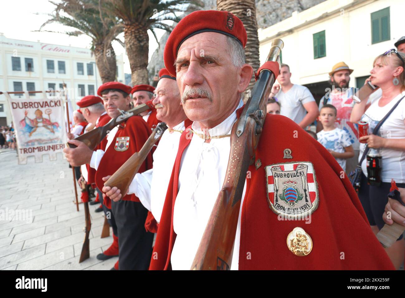 18.08.2017., Omis, Croatia - Reconstruction of the battle between Omis pirates and Venetians that took place in the 13th century. It involves hundreds of participants dressed as pirates and Venetians in the galleys and Sagitta (high speed pirate boats). From the 12th to the 14th century Omis was a dangerous place for ships to pass by, as the city was ruled by Pirates, during more then two centuries trade ships and other Wessel who encountered the Sagittas (the Arrow - special Wessel build for fast attacks and ever faster retrieval) was often attacked and defeated by the Omis pirates. The base Stock Photo