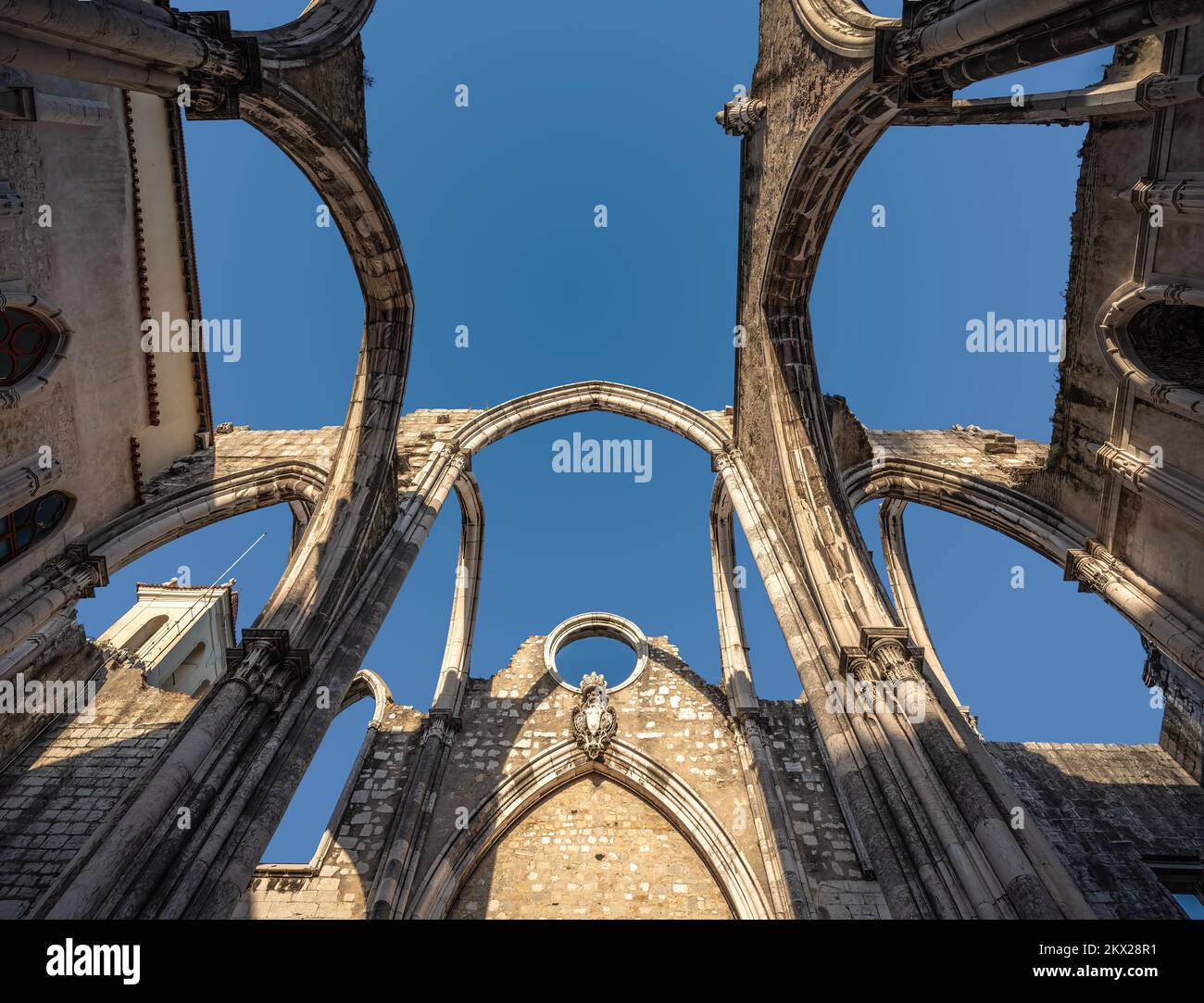 Ruined arches of the main nave of Carmo Church at Carmo Convent (Convento do Carmo) - Lisbon, Portugal Stock Photo