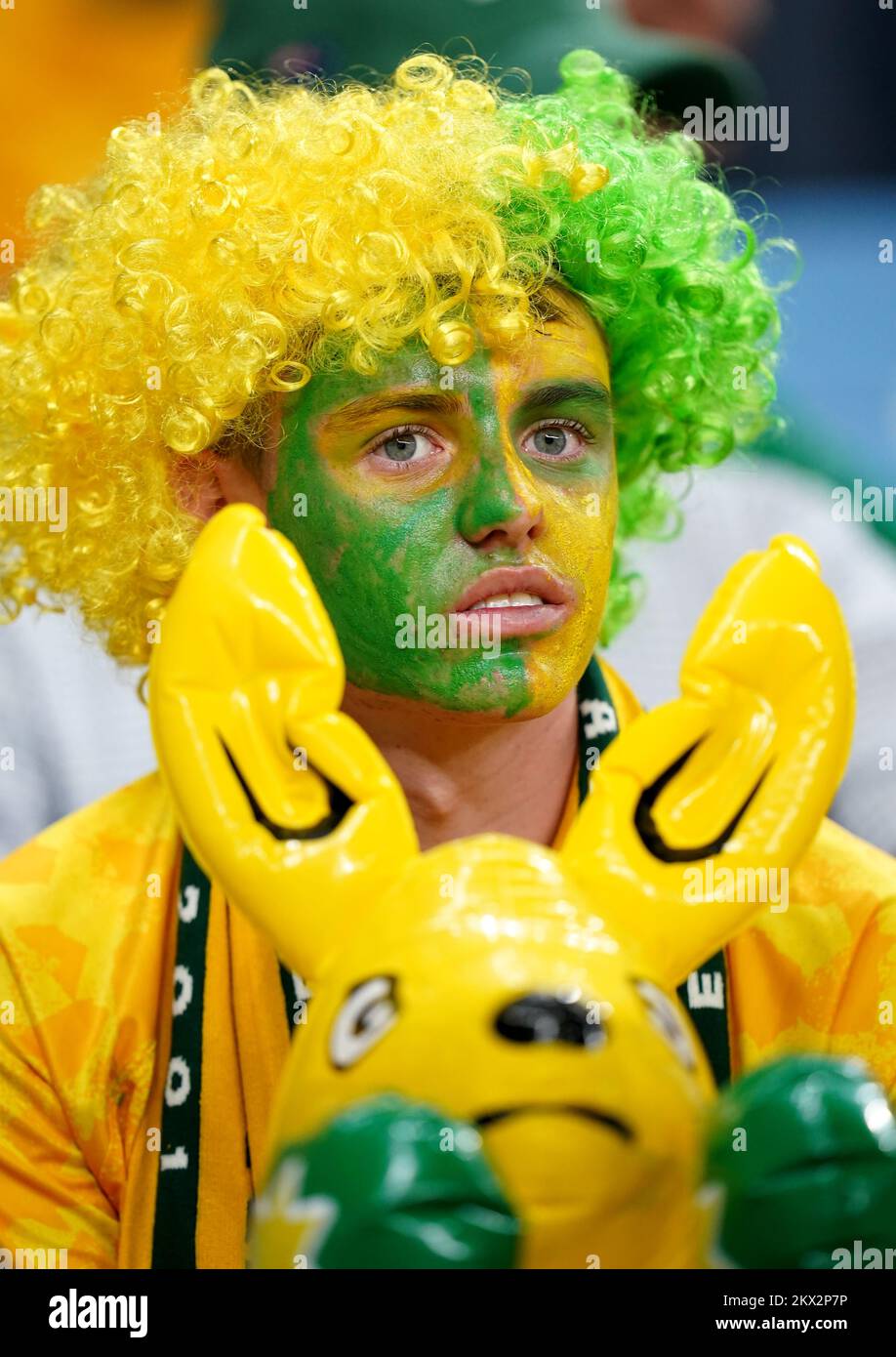 An Australia fan in the stands holding an inflatable kangaroo ahead of