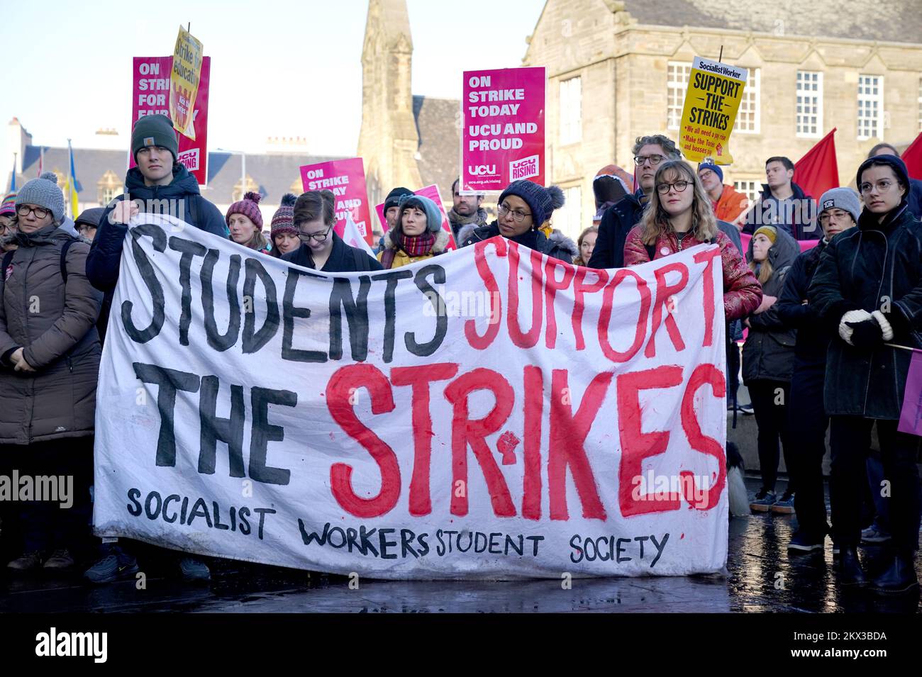 People take part in a rally outside the Scottish Parliament, Edinburgh, as members of the University and College Union (UCU) take part 24-hour stoppage among university staff in an ongoing dispute over pay, pensions and conditions. Picture date: Wednesday November 30, 2022. Stock Photo