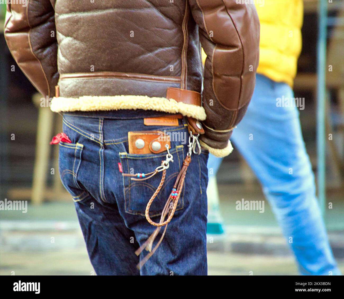 denim jeans and leather jacket phone and fob Stock Photo