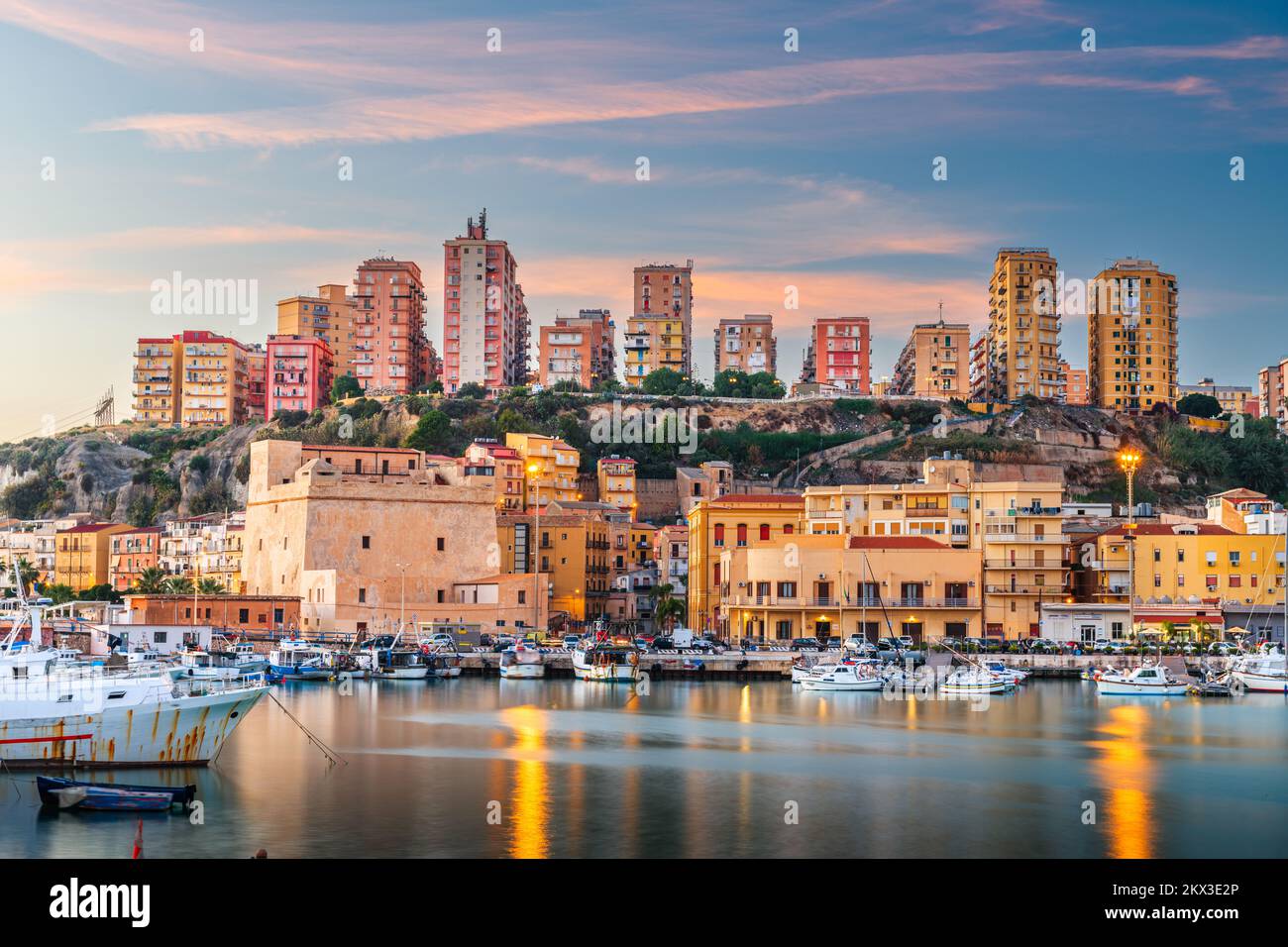 Porto Empedocle, Sicily, Italy on the water at dusk. Stock Photo