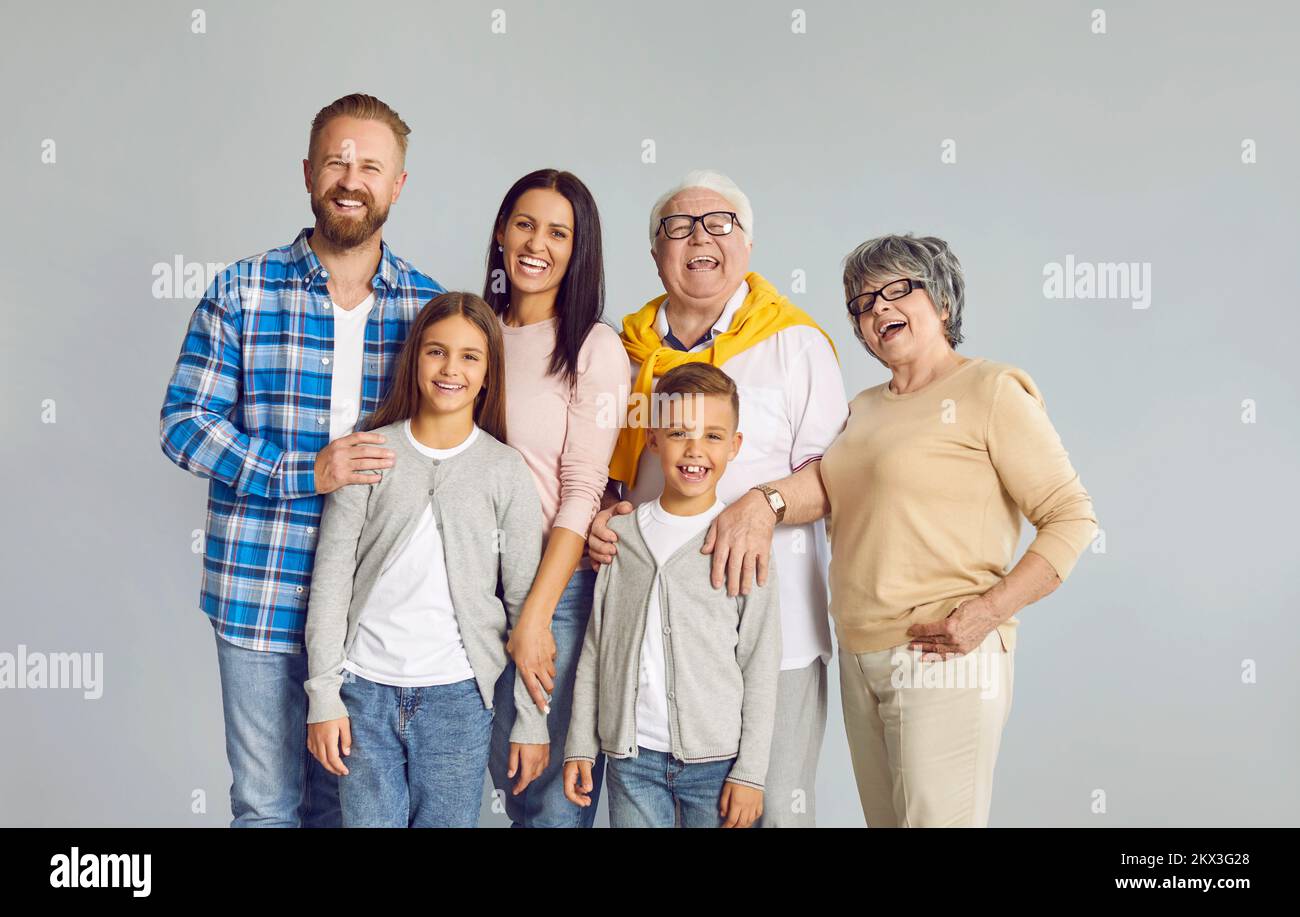 Portrait of happy smiling Caucasian large family consisting of three generations. Stock Photo