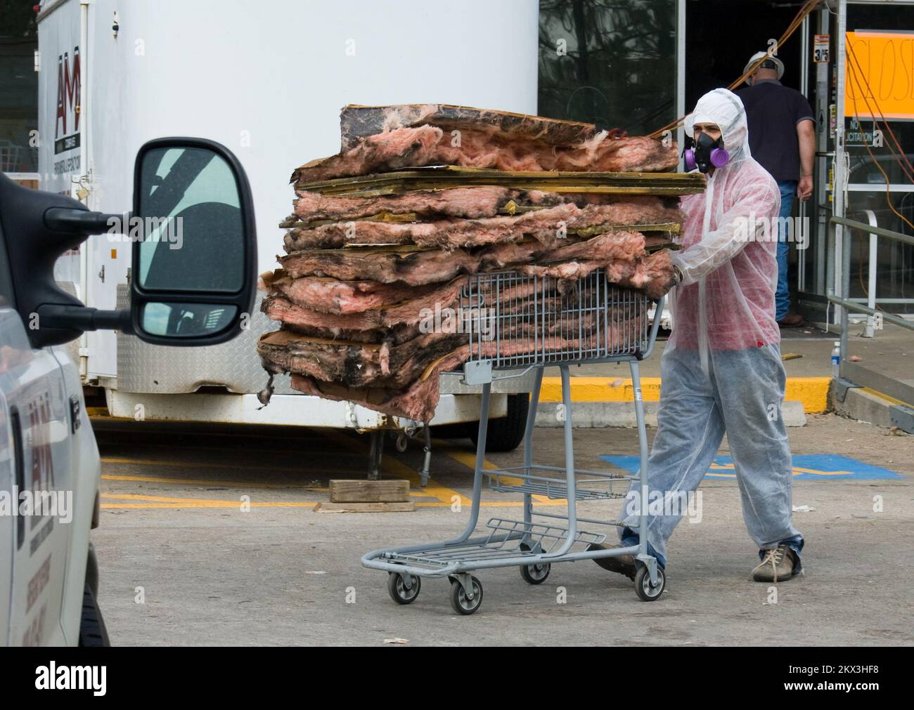 Hurricane/Tropical Storm - Winnie, Texas, September 18, 2008   A Hazmat team removes insulation from a neighborhood grocery store that suffered heavy flood damage during Hurricane Ike. The storm caused severe damage all along the southeast Texas coast when it came ashore on September 13th.. Texas Hurricane Ike. Photographs Relating to Disasters and Emergency Management Programs, Activities, and Officials Stock Photo
