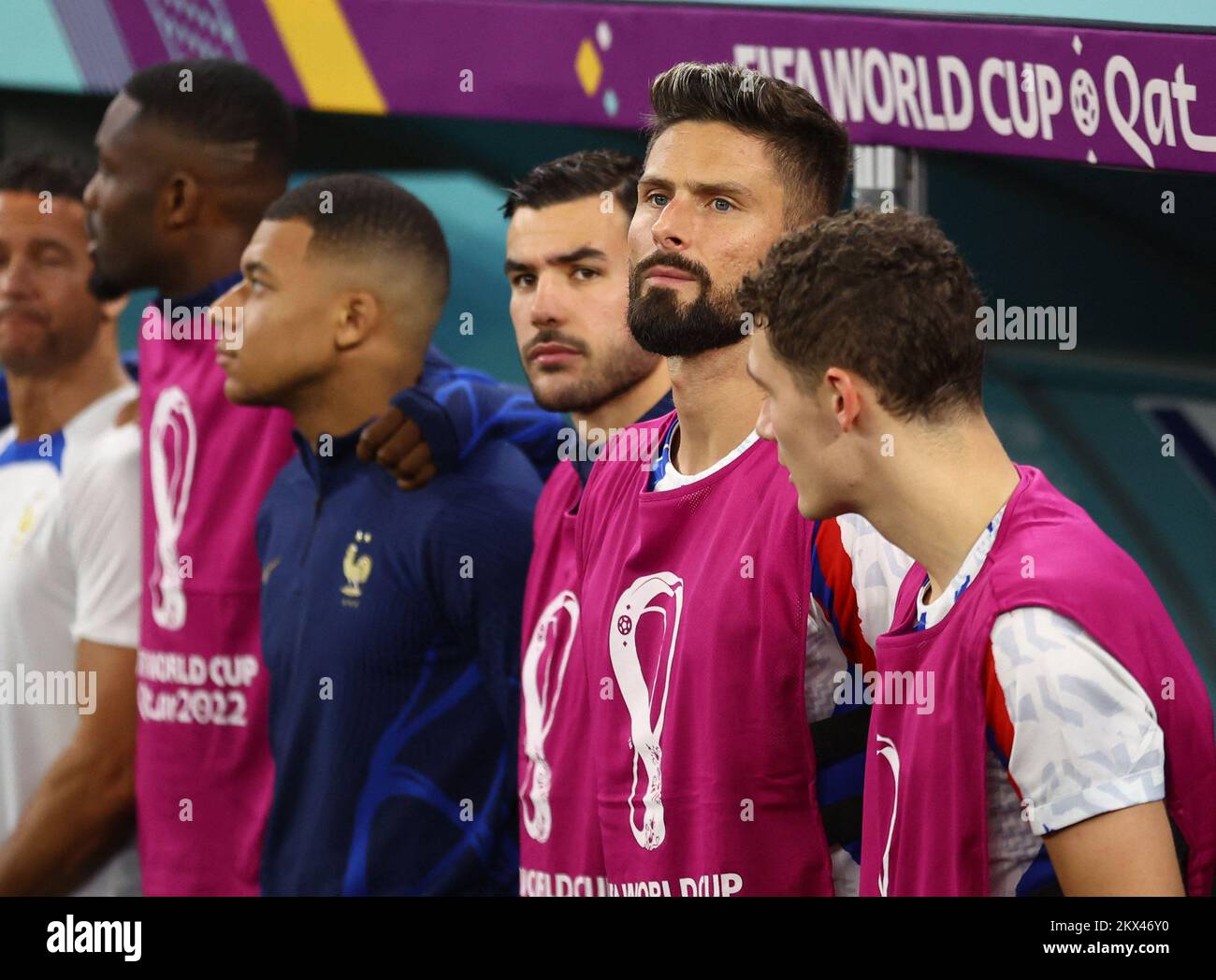 Soccer Football - FIFA World Cup Qatar 2022 - Group D - Tunisia v France - Education City Stadium, Al Rayyan, Qatar - November 30, 2022 France's Olivier Giroud lines up next to teammates on the substitutes bench before the match REUTERS/Hannah Mckay Stock Photo