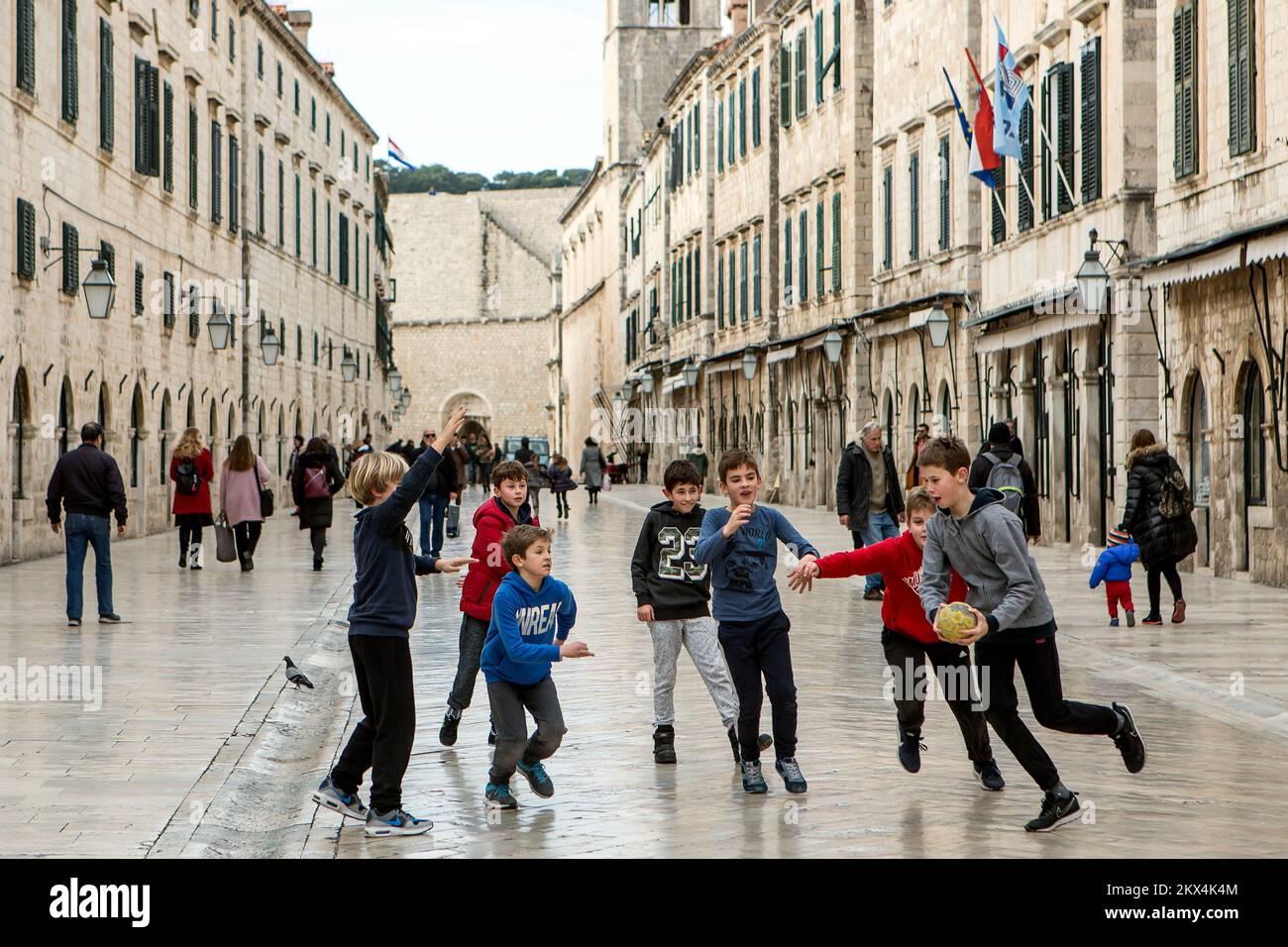 25.01.2018., Croatia, Dubrovnik - Boys playing handball on Stradun. Photo: Grgo Jelavic/PIXSELL Stock Photo