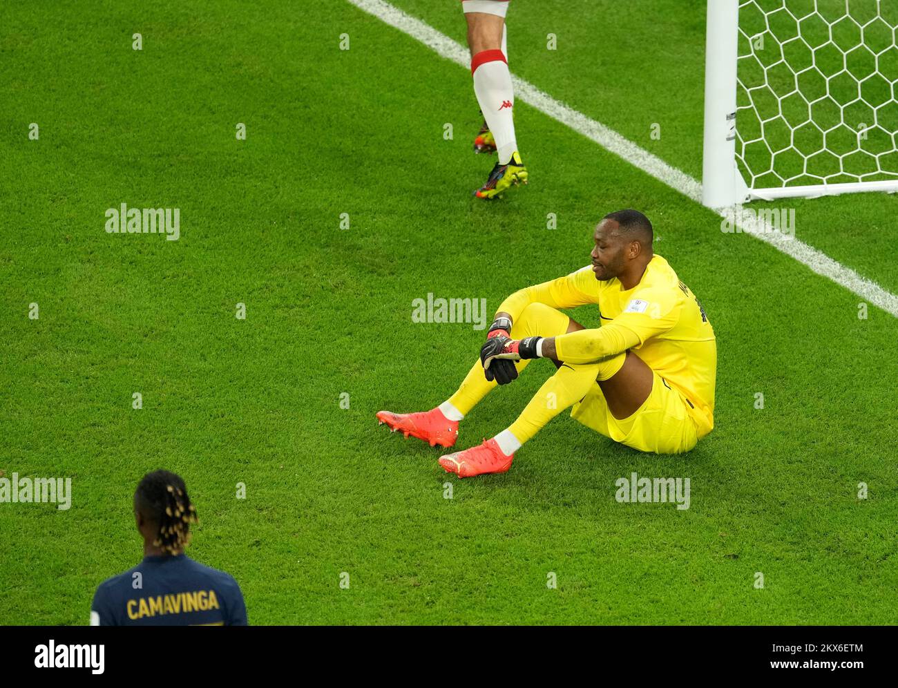 Al Rayyan, Qatar. 30th Nov, 2022. Steve Mandanda, goalkeeper of France, reacts after Nader Ghandri of Tunisia scores a goal which later is rules out for offside during the Group D match between Tunisia and France at the 2022 FIFA World Cup at Education City Stadium in Al Rayyan, Qatar, Nov. 30, 2022. Credit: Xiao Yijiu/Xinhua/Alamy Live News Stock Photo