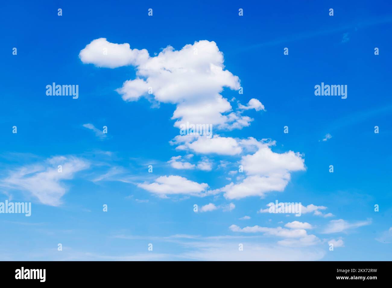 White clouds in the blue sky. Perfect cloudscape background. Stock Photo