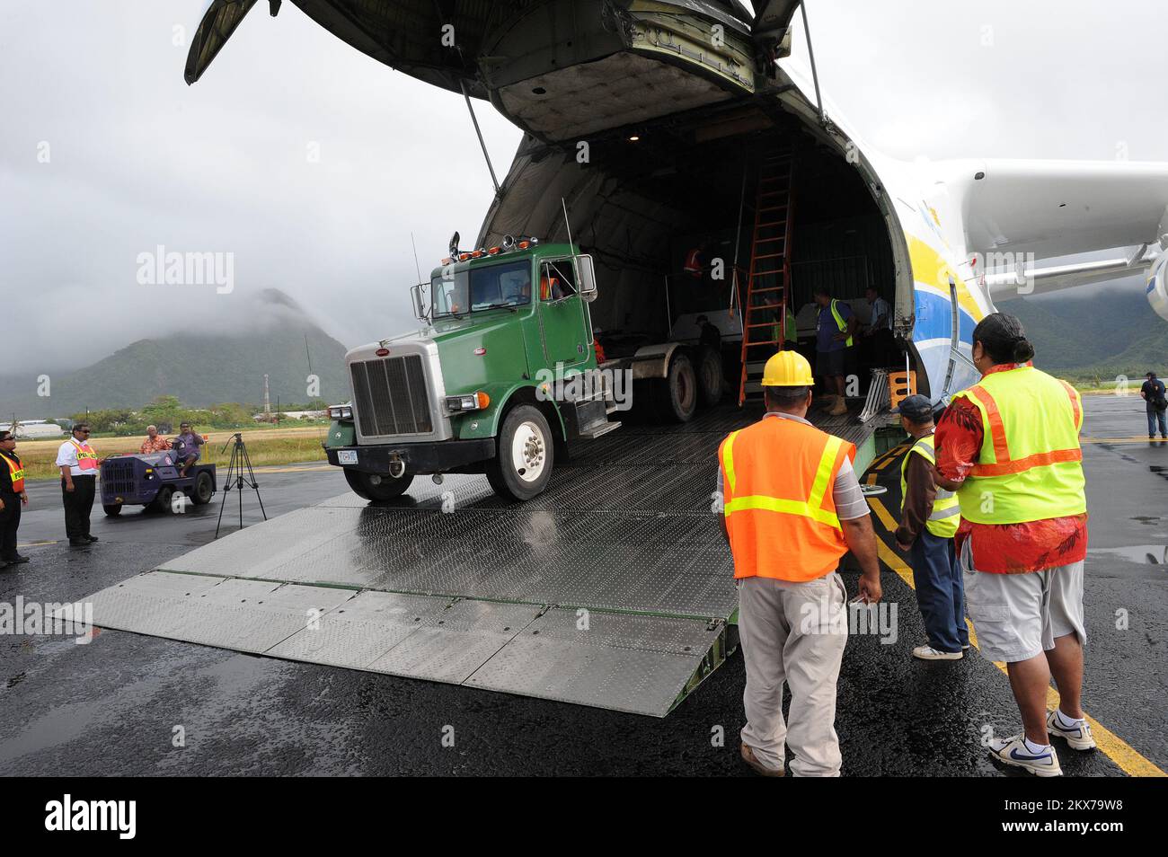 Generators Rolling Off Of Antonov Cargo Plane in American Samoa. American Samoa Earthquake, Tsunami, and Flooding. Photographs Relating to Disasters and Emergency Management Programs, Activities, and Officials Stock Photo