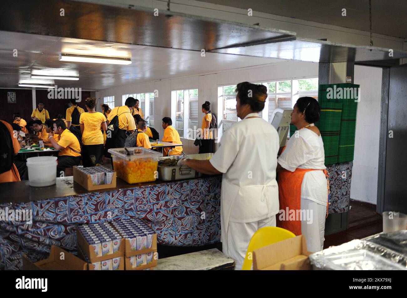 Cafeteria Workers Serve Breakfast to Students. American Samoa Earthquake, Tsunami, and Flooding. Photographs Relating to Disasters and Emergency Management Programs, Activities, and Officials Stock Photo