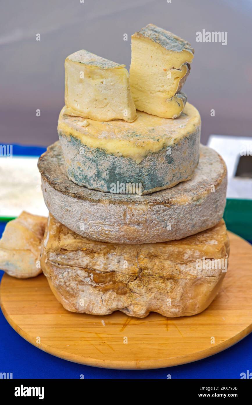 Stacked Wheels of Cave Aged Smelly Stinky Strong Cheese Stock Photo