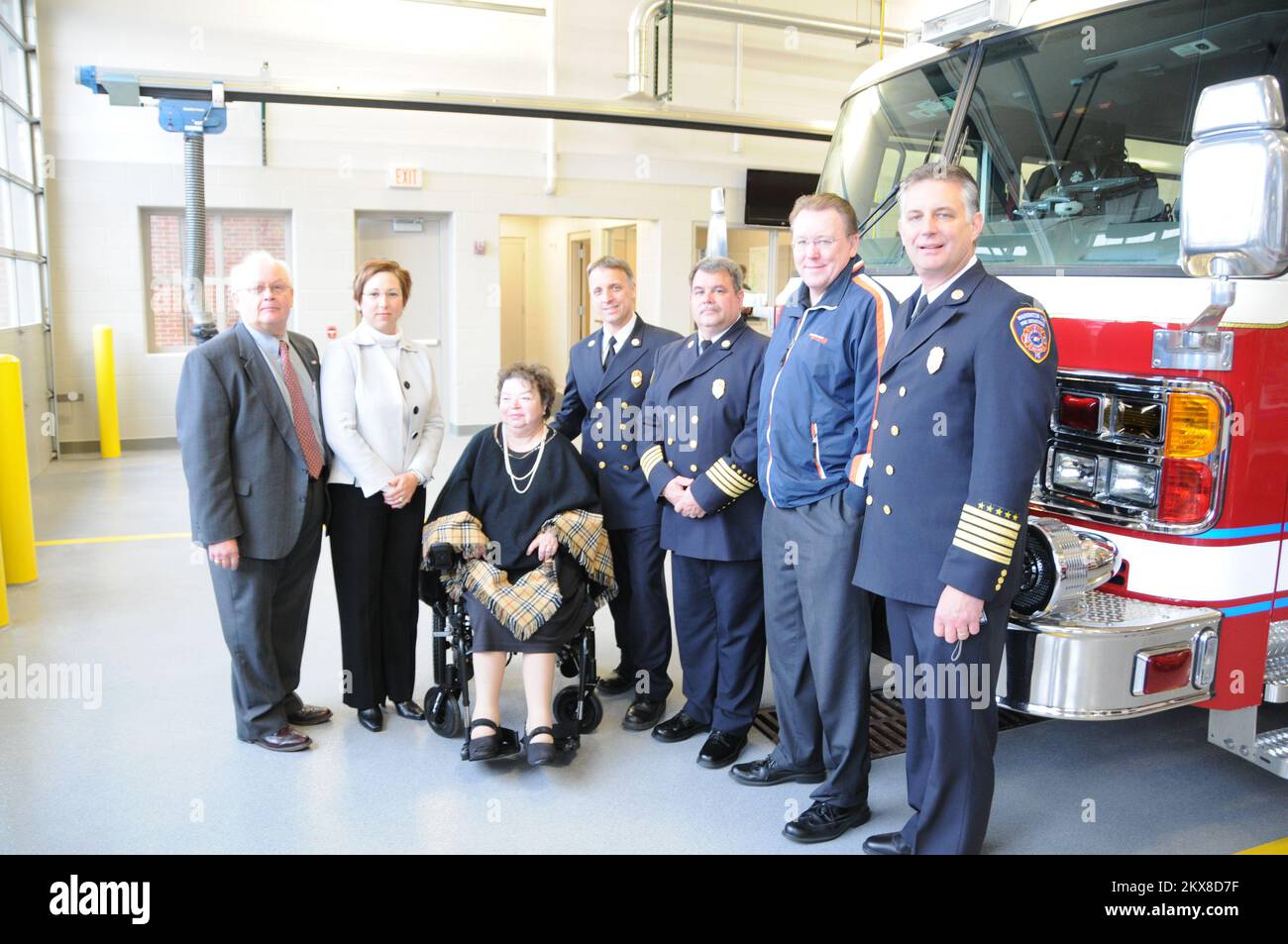 Fire - Mich. , November 23, 2010   Assistant Administrator, Elizabeth Harmon (second from left) attends the dedication of the first fire station built with funds from the American Recovery and Reinvestment Act (ARRA) held at the Washington Township Fire Department in Michigan. From left, Jim Richardson, Elizabeth Harmon, Linda Verellen, Brian Tyrell, John Clark, Don Brown, and David Poterek. FEMA Photo/Mark Peterson.. Photographs Relating to Disasters and Emergency Management Programs, Activities, and Officials Stock Photo