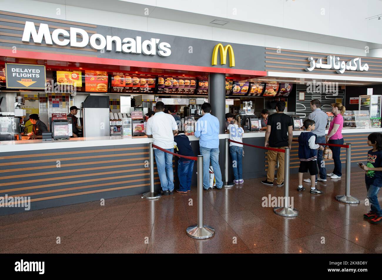 DUBAI, UAE - MARCH 10, 2015: DXB airport interior. Dubai International Airport is the primary airport serving Dubai, United Arab Emirates, and is the Stock Photo