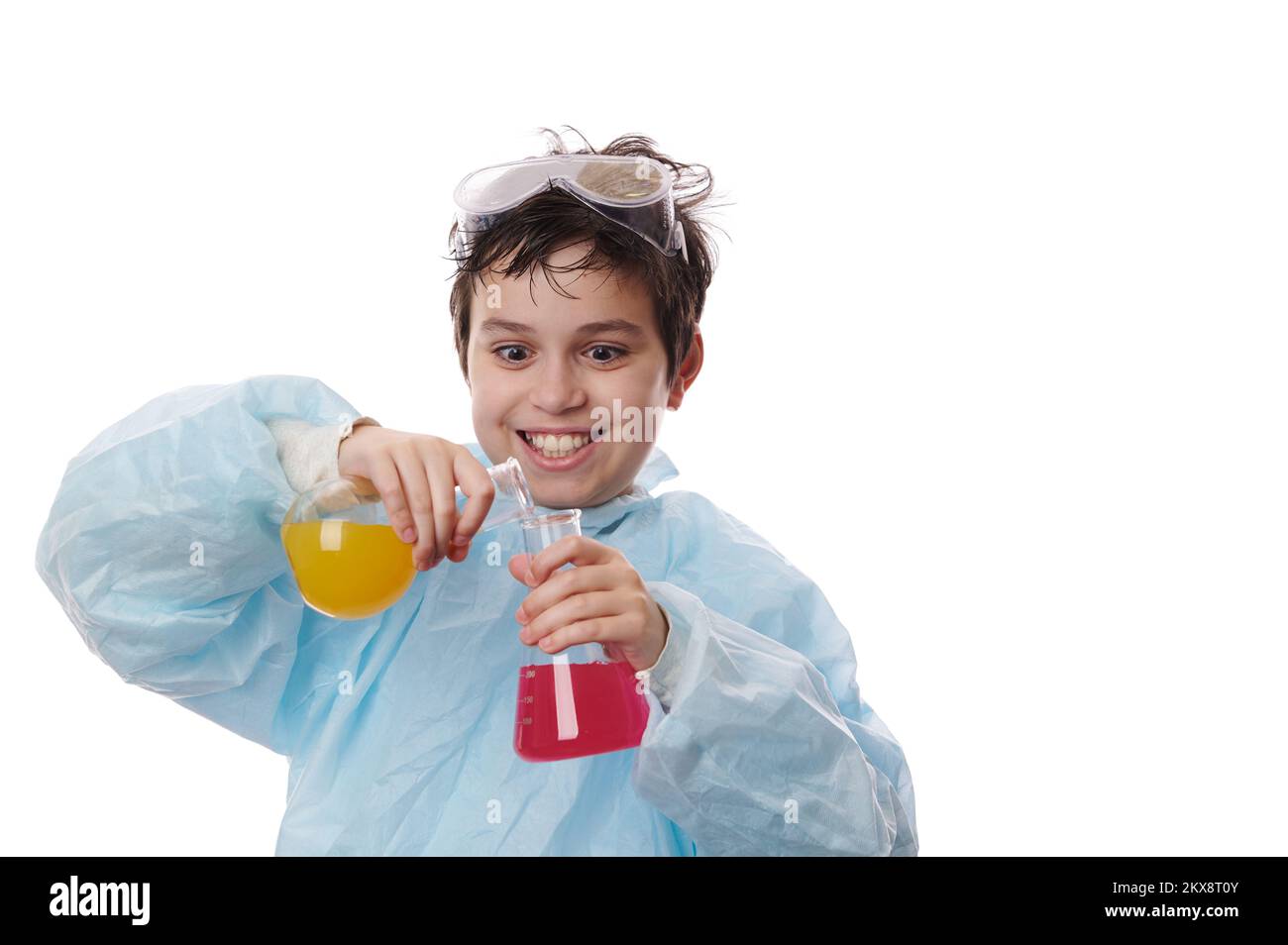 Chemistry lesson. Smart preteen child boy, a chemist scientist doing