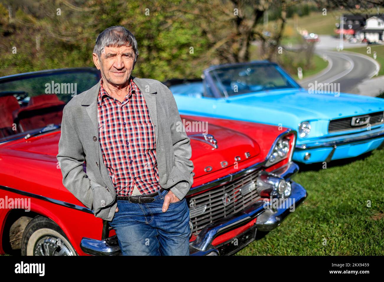 24.10.2018., Croatia, Generalski Stol - Vlado Skrtic buys and repairs oldtimers. More than 30 American cars went through his garage. Currently owns three cars that are rarely seen on Croatian roads. Red White Dodge Coronet from 1958, Blue Ford Mustang, and Volkswagen Beetle, adapted for off-road driving. His favorite car is Dodge Coronet. Photo: Slavko Midzor/PIXSELL Stock Photo