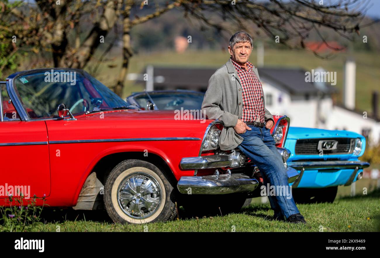 24.10.2018., Croatia, Generalski Stol - Vlado Skrtic buys and repairs oldtimers. More than 30 American cars went through his garage. Currently owns three cars that are rarely seen on Croatian roads. Red White Dodge Coronet from 1958, Blue Ford Mustang, and Volkswagen Beetle, adapted for off-road driving. His favorite car is Dodge Coronet. Photo: Slavko Midzor/PIXSELL Stock Photo