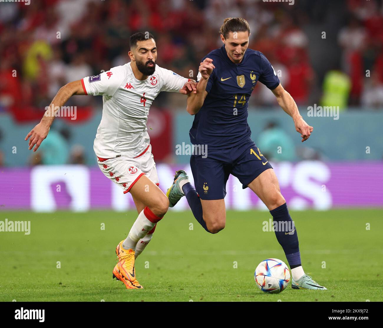 Ar Rayyan, Qatar, 30th November 2022. Yassine Meriah of Tunisia tussles with Adrien Rabiot of France  during the FIFA World Cup 2022 match at Education City Stadium, Ar Rayyan. Picture credit should read: David Klein / Sportimage Credit: Sportimage/Alamy Live News Stock Photo