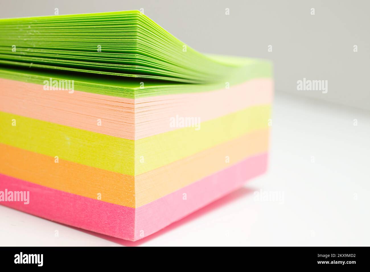 Multicolored  stickers stack on white background, soft focus close up Stock Photo