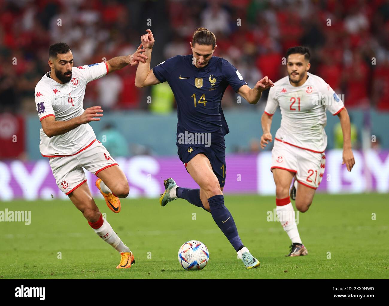 Ar Rayyan, Qatar, 30th November 2022. Yassine Meriah of Tunisia tussles with Adrien Rabiot of France  during the FIFA World Cup 2022 match at Education City Stadium, Ar Rayyan. Picture credit should read: David Klein / Sportimage Credit: Sportimage/Alamy Live News Stock Photo
