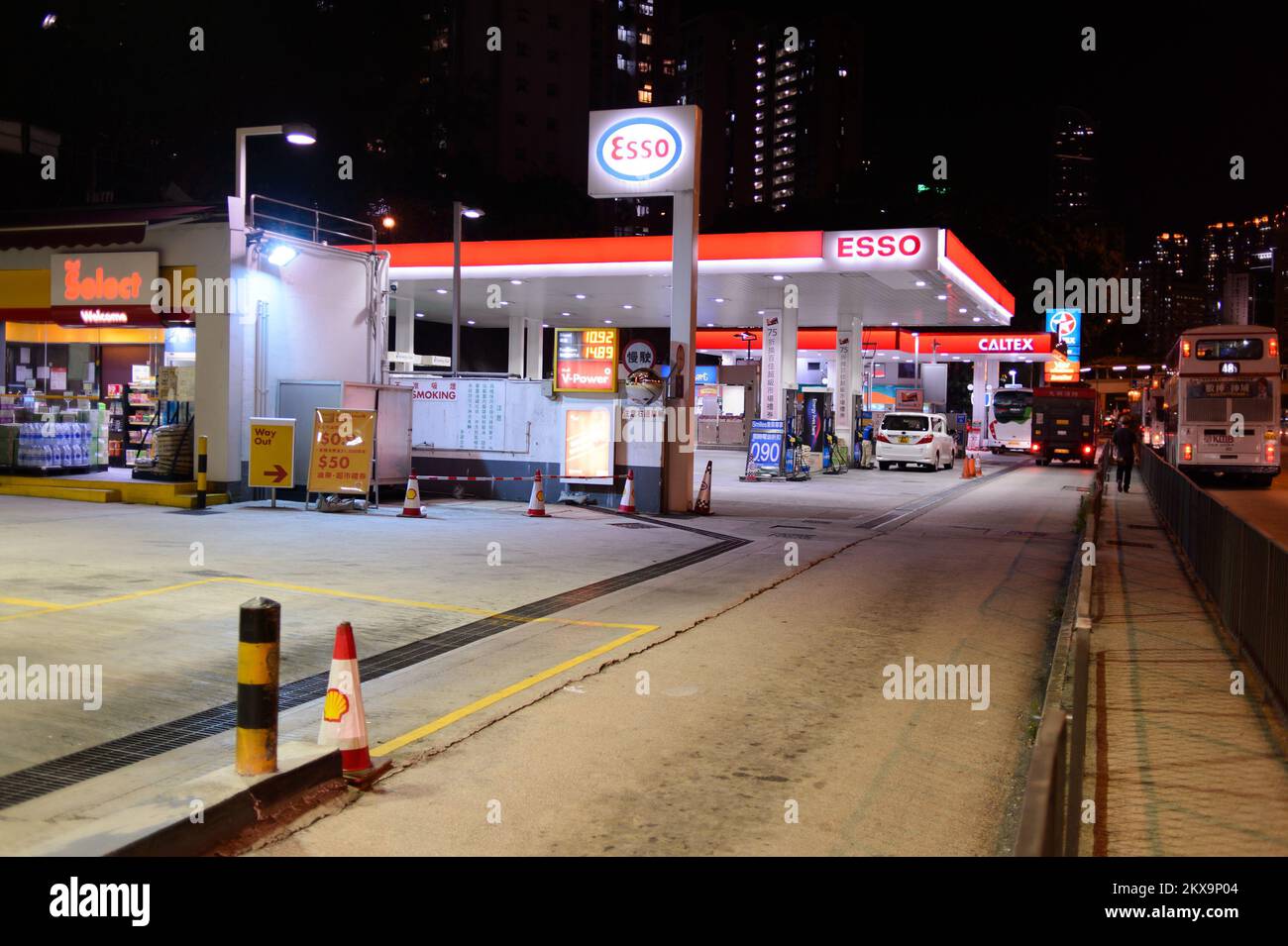 HONG KONG - APRIL 15, 2015: Esso fuel station at evening. Esso is an international trade name for ExxonMobil and its related companies. Stock Photo