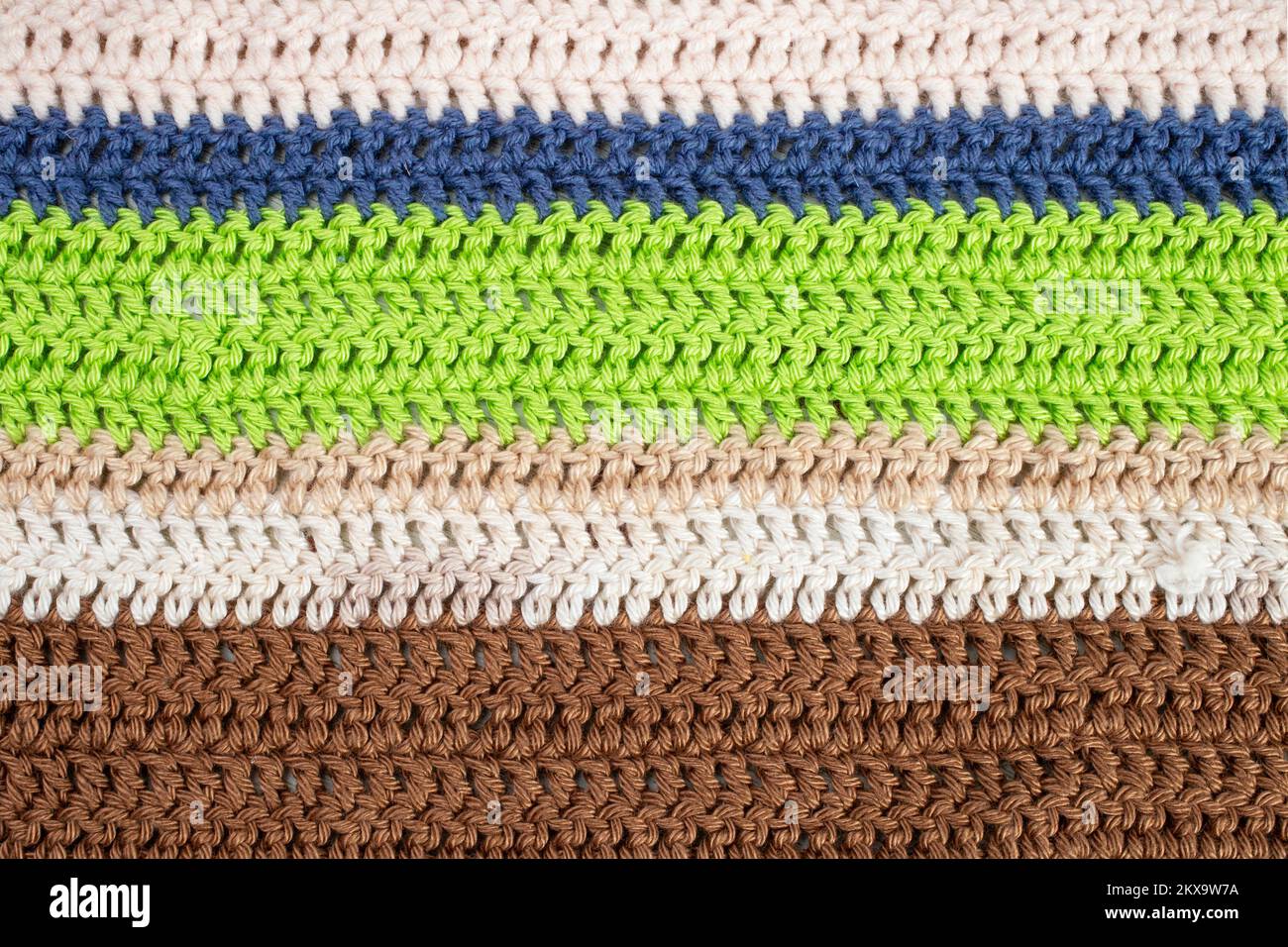 horizontal colored crochet lines pattern, beige, blue, green and brown ...