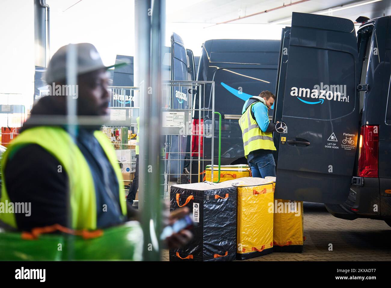 ROZENBURG Amazon drivers load their packages into the car at the