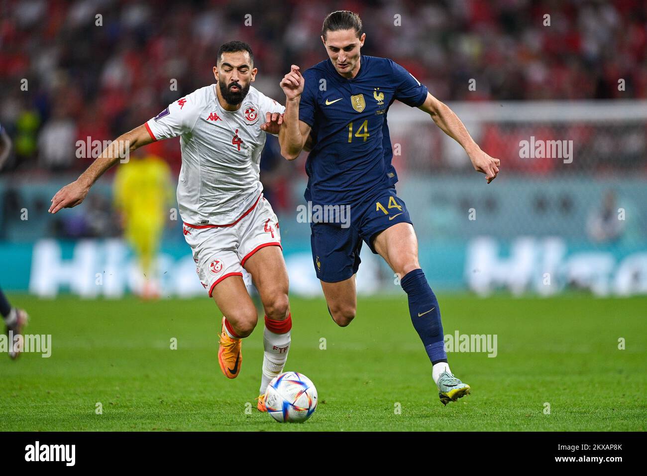 AL RAYYAN, QATAR - NOVEMBER 30: Yassine Meriah of Tunisia battles for the ball with Adrien Rabiot of France during the Group D - FIFA World Cup Qatar 2022 match between Tunisia and France at the Education City Stadium on November 30, 2022 in Al Rayyan, Qatar (Photo by Pablo Morano/BSR Agency) Credit: BSR Agency/Alamy Live News Stock Photo