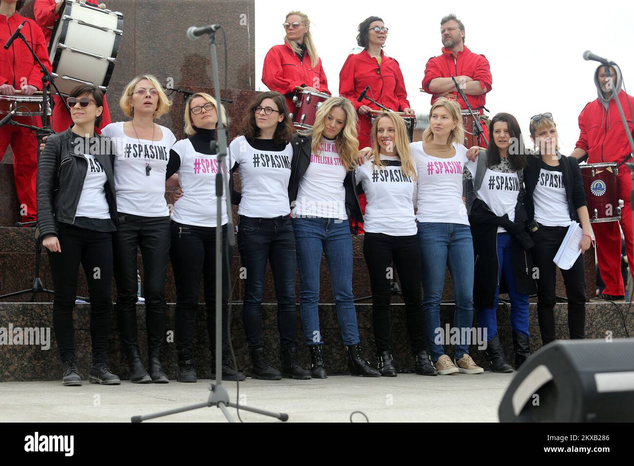 16.03.2019., King Tomislav Square. Zagreb, Croatia - Supporters of the #spasime (#saveme) social network movement carry a sing during a protest against domestic violence. Organizer of the #Spasime (#Saveme) campaign, Croatian actress and producer Jelena Veljaca. Photo: Dalibor Urukalovic/PIXSELL Stock Photo