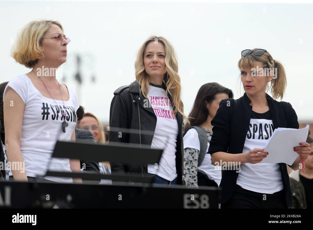 16.03.2019., King Tomislav Square. Zagreb, Croatia - Supporters of the #spasime (#saveme) social network movement carry a sing during a protest against domestic violence. Organizer of the #Spasime (#Saveme) campaign, Croatian actress and producer Jelena Veljaca. Photo: Dalibor Urukalovic/PIXSELL Stock Photo
