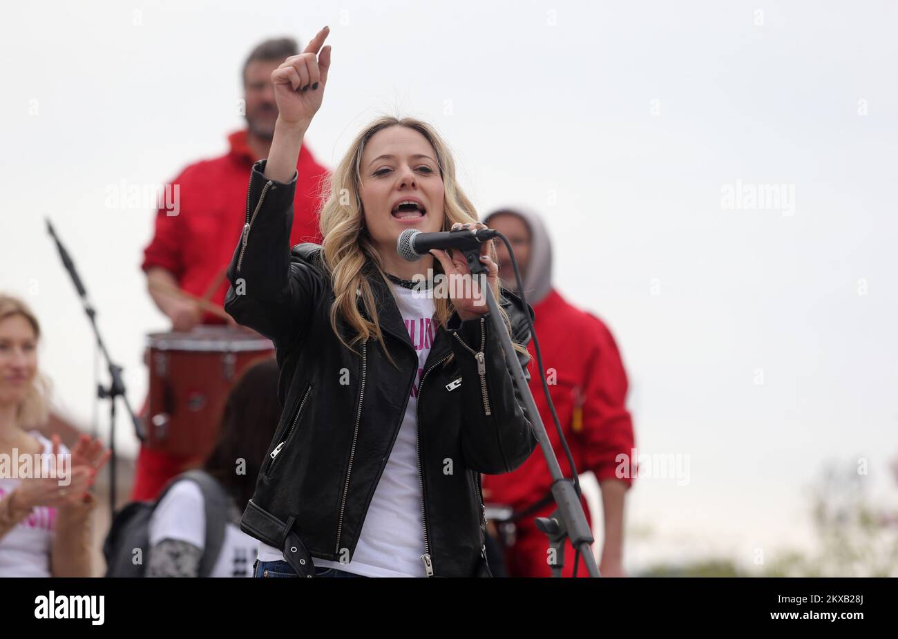 16.03.2019., King Tomislav Square. Zagreb, Croatia - Supporters of the #spasime (#saveme) social network movement carry a sing during a protest against domestic violence. Organizer of the #Spasime (#Saveme) campaign, Croatian actress and producer Jelena Veljaca. Photo: Dalibor Urukalovic/PIXSELL Stock Photo