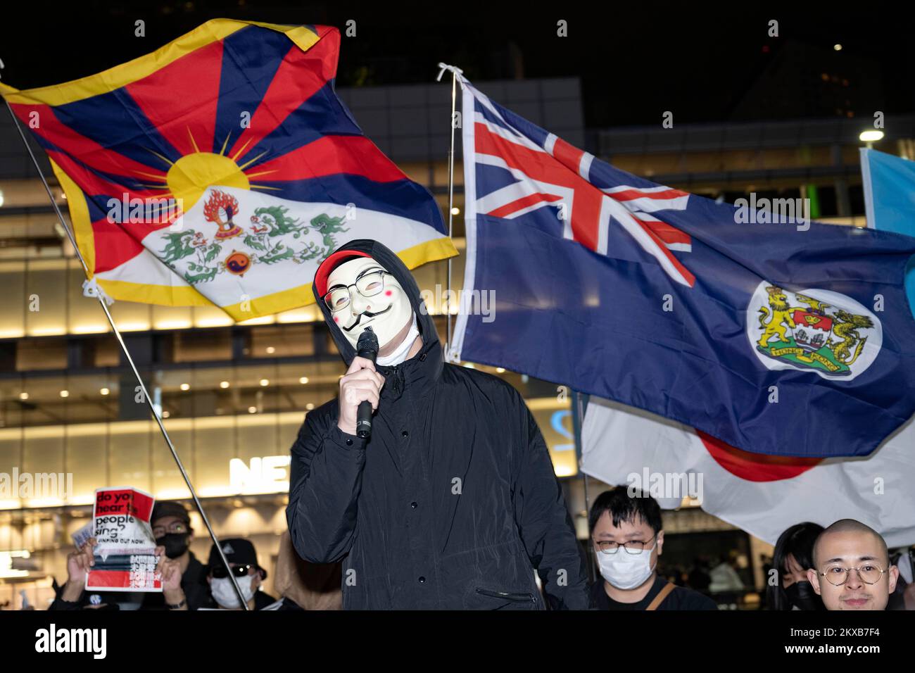 Tokyo, Japan. 30th Nov, 2022. Protesters with Guy Fawkes masks from ...