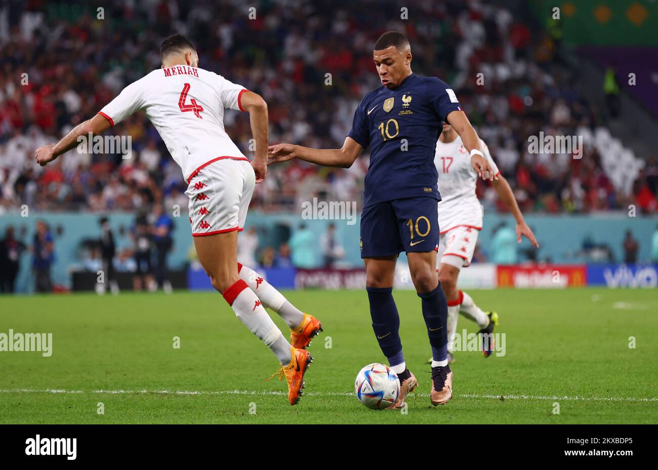 Ar Rayyan, Qatar, 30th November 2022.   Kylan Mbappe of France tries to go past Yassine Meriah of Tunisiaduring the FIFA World Cup 2022 match at Education City Stadium, Ar Rayyan. Picture credit should read: David Klein / Sportimage Credit: Sportimage/Alamy Live News Stock Photo